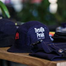 Load image into Gallery viewer, Tshepo x Devil's Peak 5-Panel Drawstring Hat.